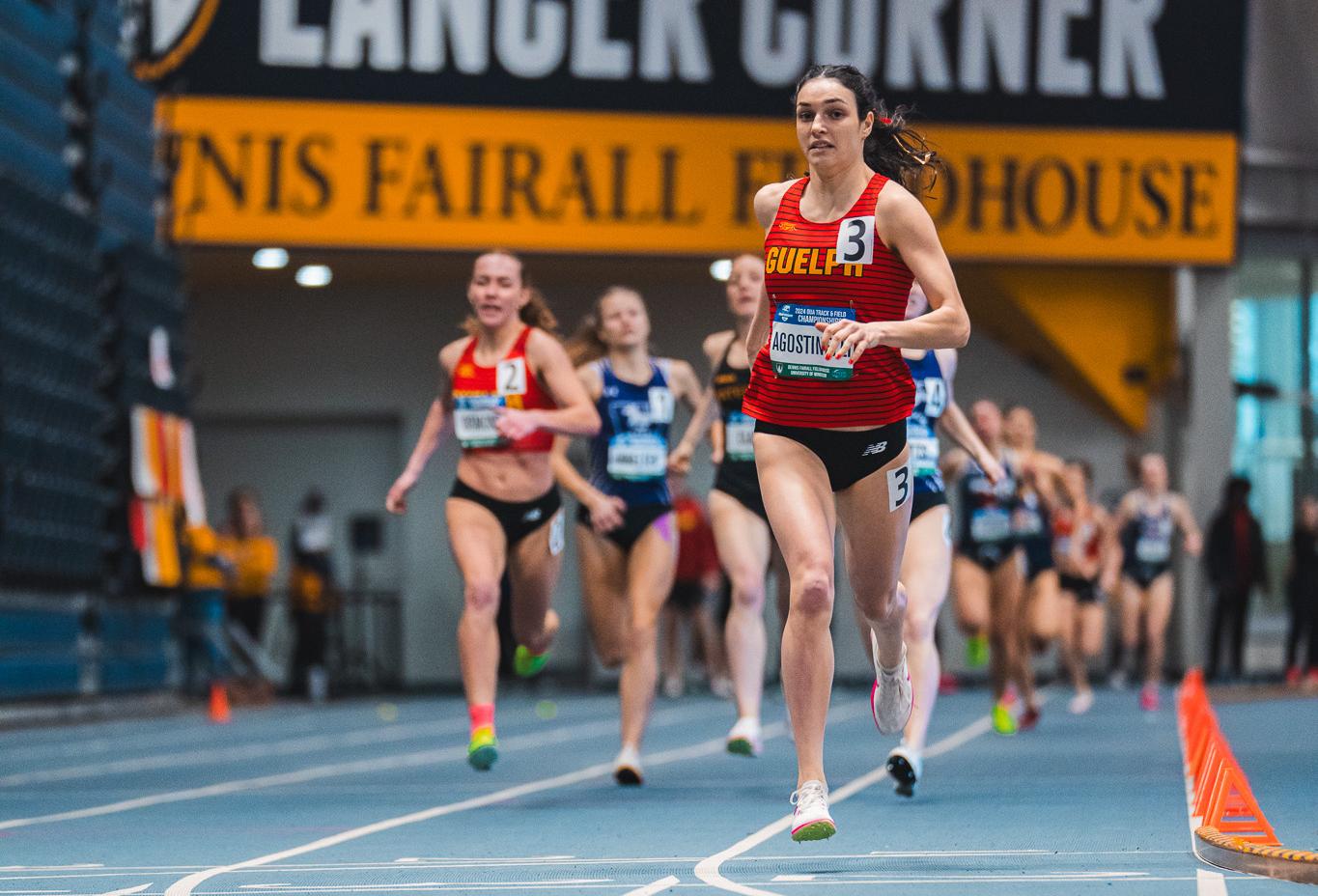 Image of Guelph Track athlete Julia Agostinelli running on the track lane.