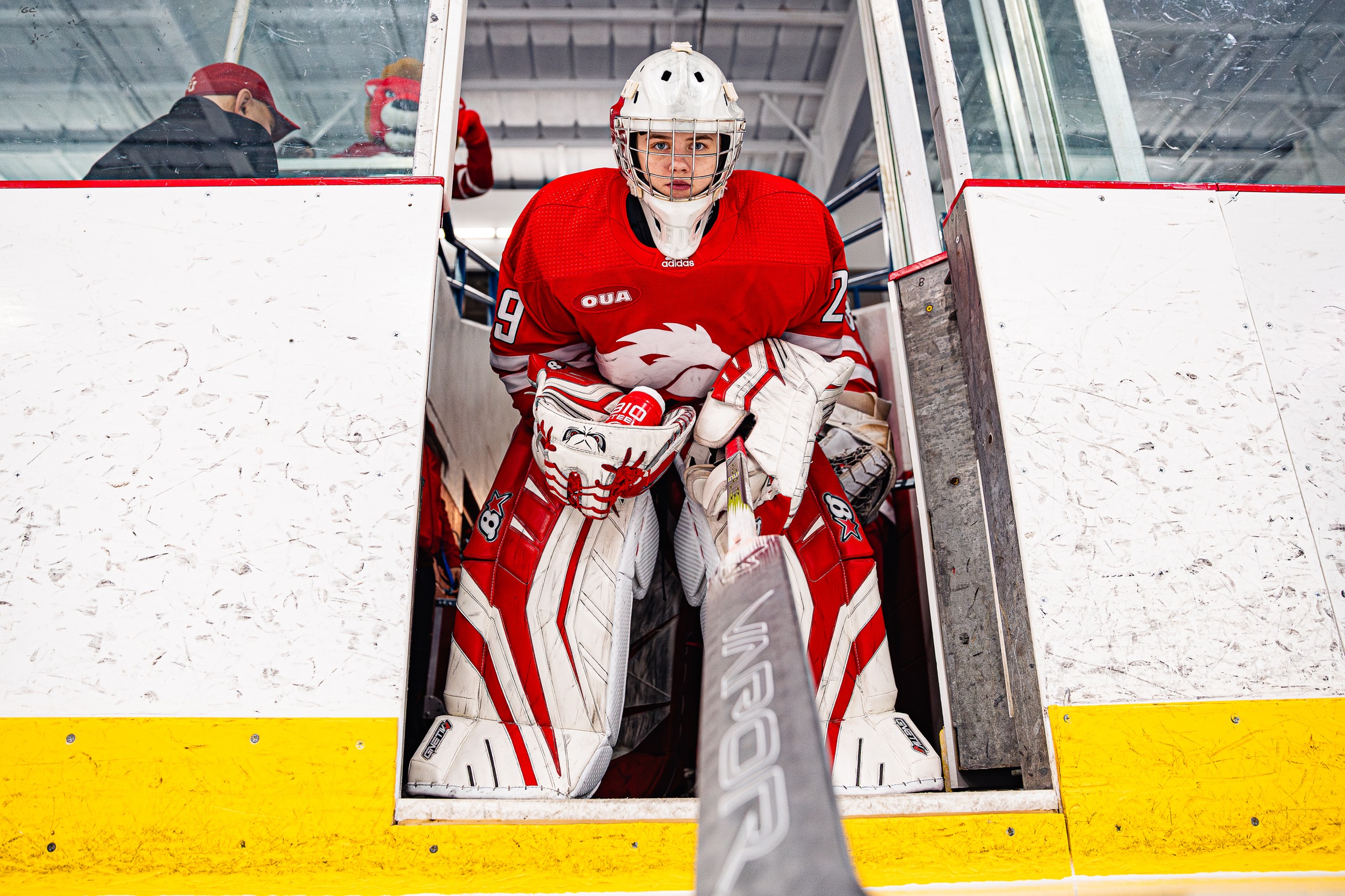 Image of York Lions Women's Hockey Goalie Emma Wedgewood in full gear coming out of the gate. 