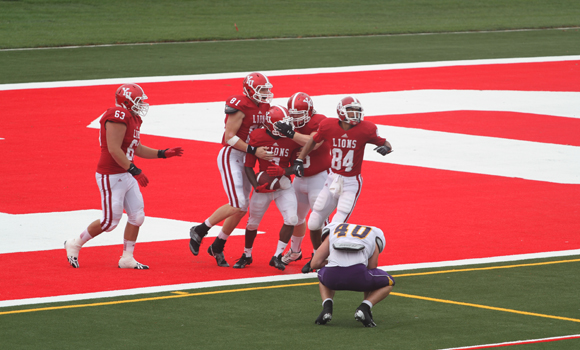 Lions celebrate turf unveiling with win over Golden Hawks