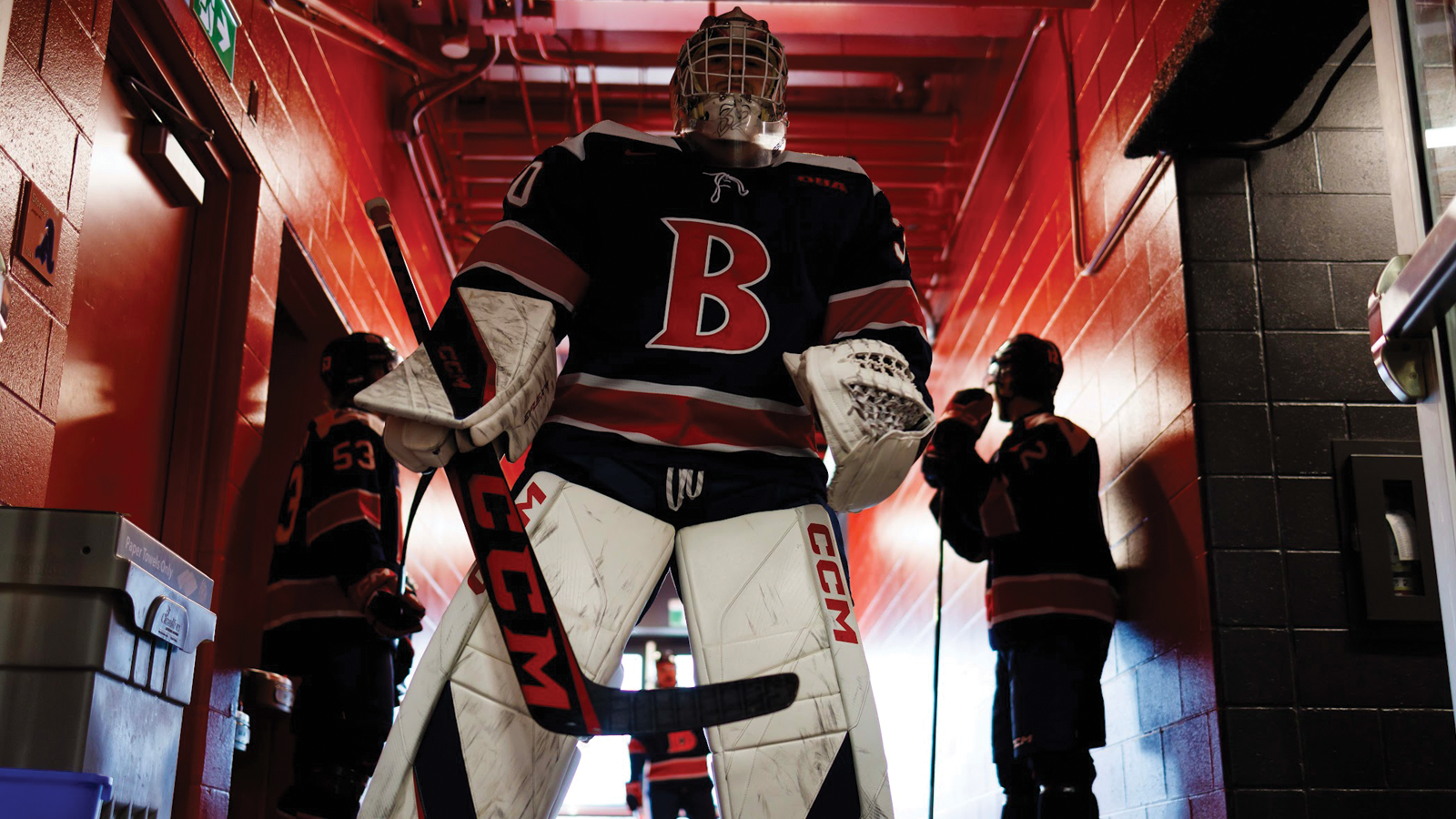 Brock goaltender Connor Ungar standing in the tunnel in full uniform and equipment prior to a game