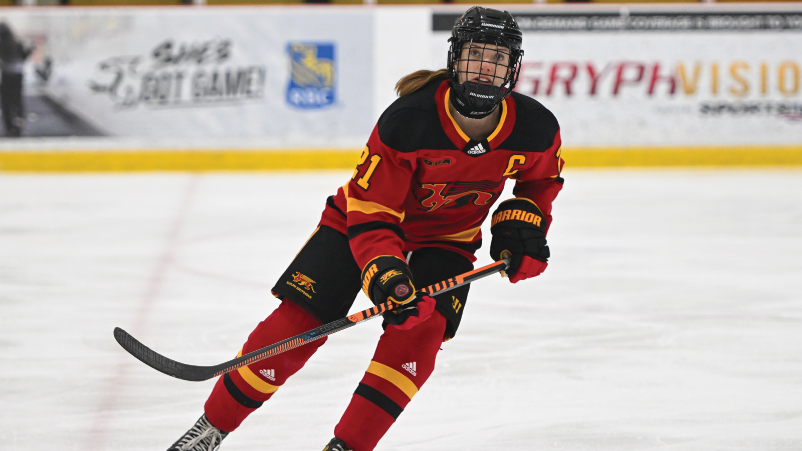 Guelph women's hockey player Hannah Tait skating on the ice during a game