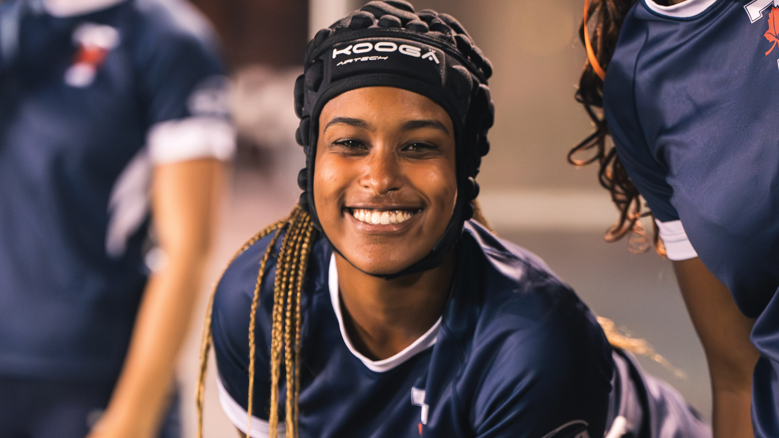Posed photo of Toronto women's rugby player Kiyabel Samuel smiling in full uniform