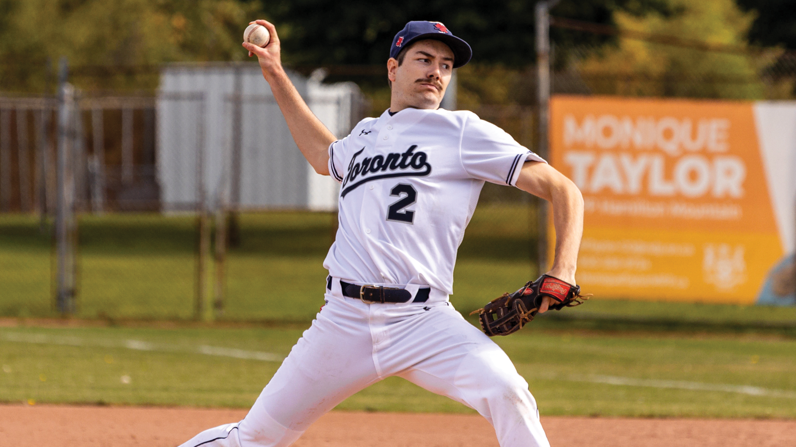 Toronto baseball pitcher Kevin Angers in mid-pitch on the mound during a game